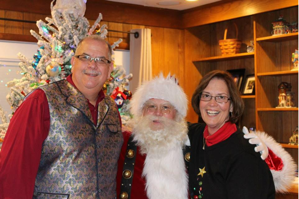 Dave dressed as Santa with Mary Ann and their brother Tom