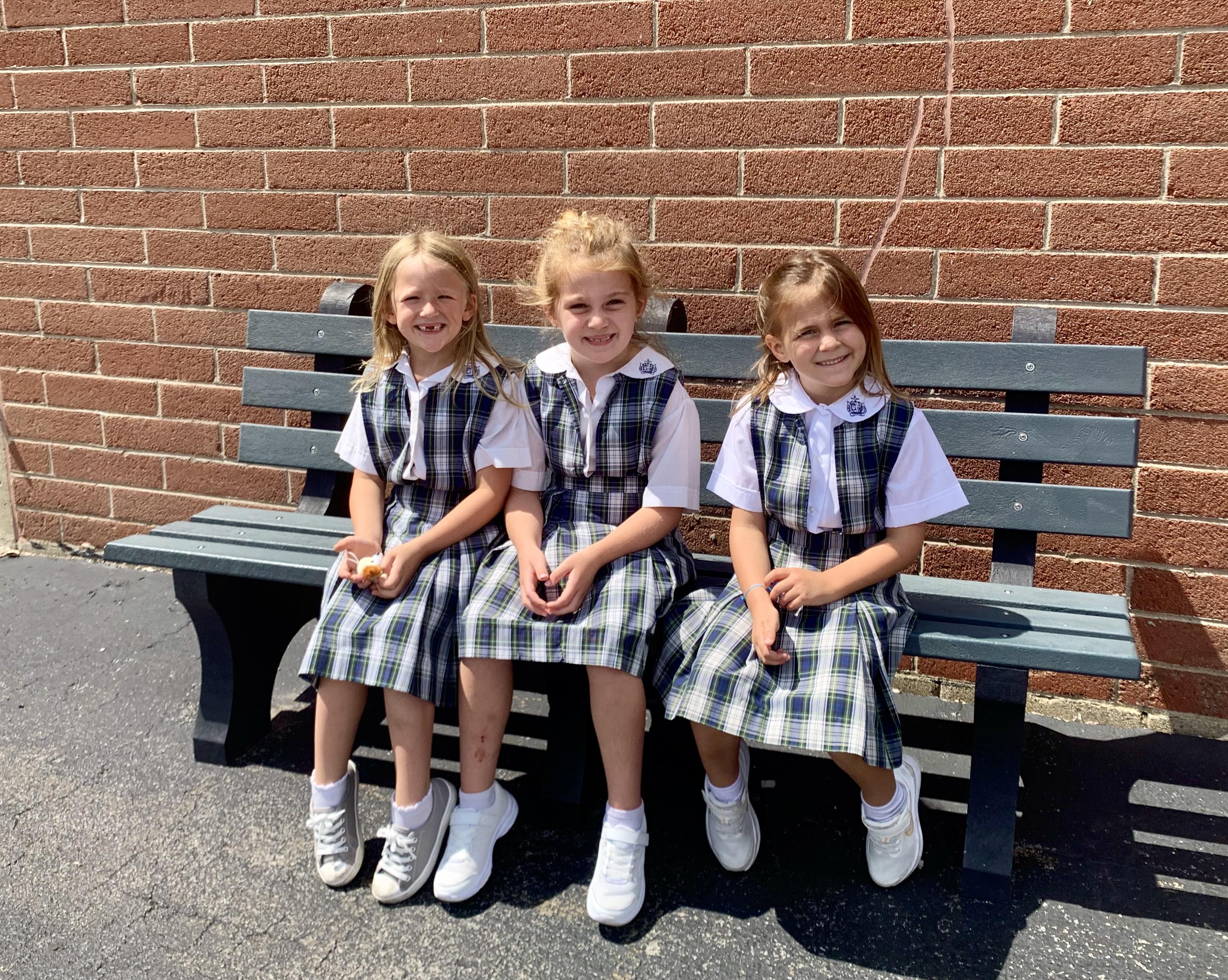 Girls sitting on bench